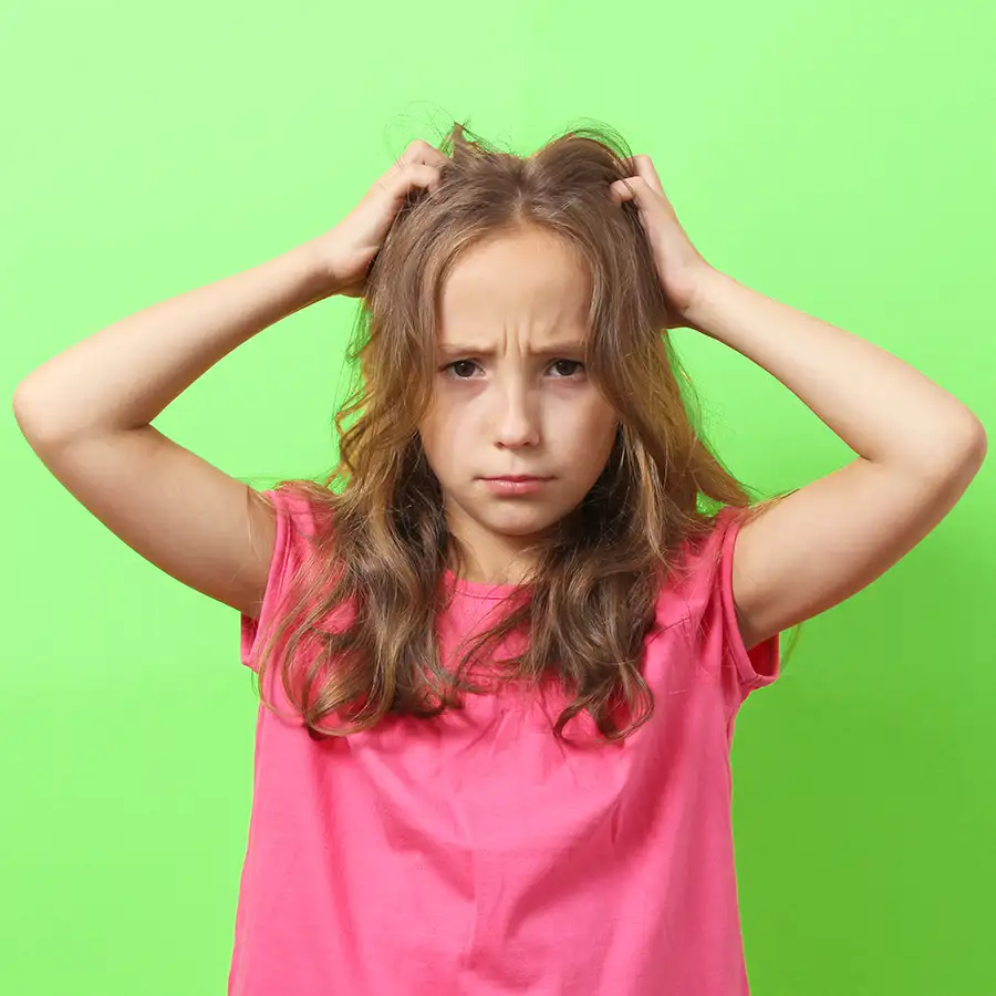 Little girl with itchy scalp, signs of head lice infestation - Chesterfield, MO